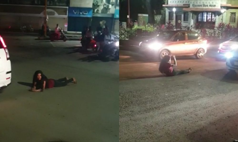 Viral video: Drunk woman lies down on road, disrupts traffic in Pune as ...